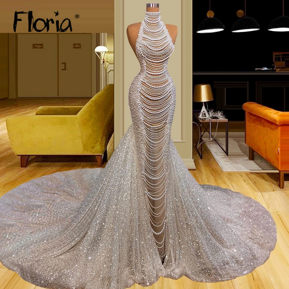 Elegant Full Pearls Mermaid Wedding Gowns Halter Luxury Beaded Court Train Bridal Dresses 2023 Dubai Robe de Mariée Plus Size
Elegant Full Pearls Mermaid Wedding Gowns Halter Luxury Beaded Court Train Bridal Dresses 2023 Dubai Robe de Mariée Plus Size