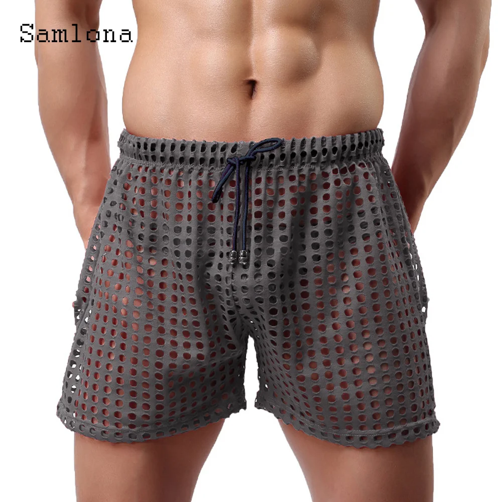 Sexy ollow Out Sorts European Style Casual Beac Sort Cross-pant Black Men See Trou Fetis Loose Drawstrin otpants 
Sexy ollow Out Sorts European Style Casual Beac Sort Cross-pant Black Men See Trou Fetis Loose Drawstrin otpants
