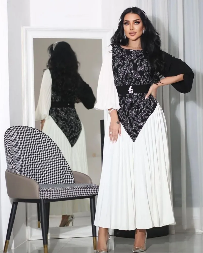 Женское шифоновое платье с рукавами-фонариками и рюшами
Женское шифоновое платье с рукавами-фонариками и рюшами