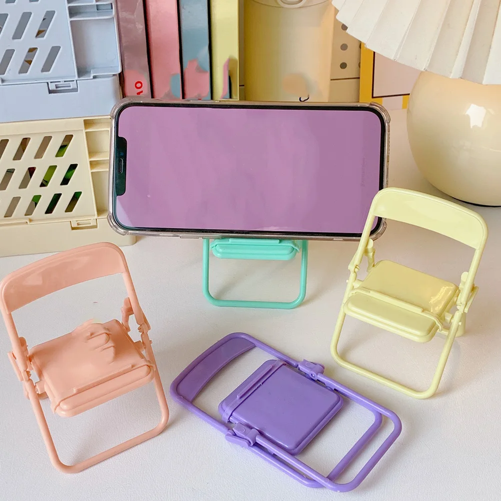 1PCS Mobile Tablet Holder Mini Folding Chair Stand Table Cell Phone Holder For IPhone Xiaomi Huawei Phone Portable Bracket
1PCS Mobile Tablet Holder Mini Folding Chair Stand Table Cell Phone Holder For IPhone Xiaomi Huawei Phone Portable Bracket