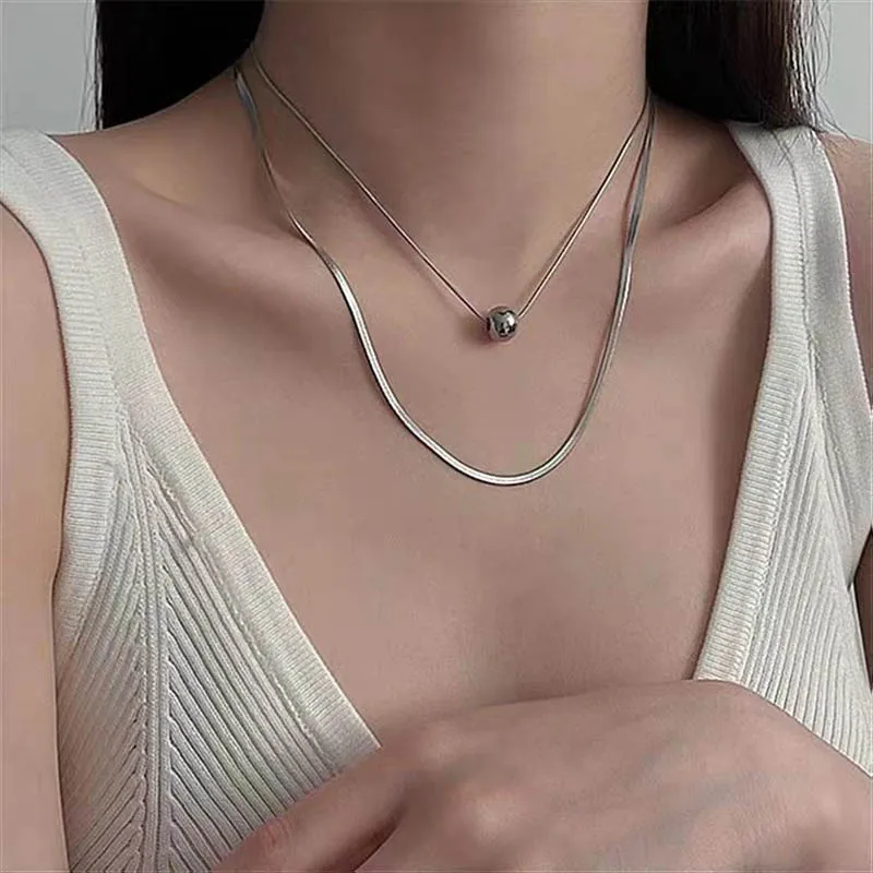 Double Layer Stainless Steel Snake Chain Collar Necklace for Women Simple Round Bead Pendant Choker Girls Hip Hop Neck Chains
Double Layer Stainless Steel Snake Chain Collar Necklace for Women Simple Round Bead Pendant Choker Girls Hip Hop Neck Chains