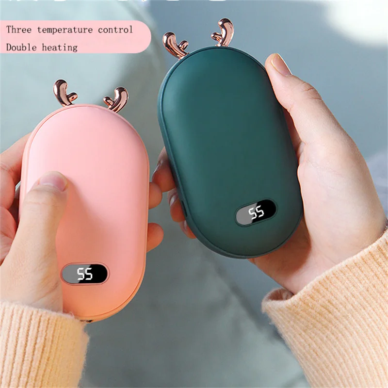 USB Electric Hand Warming Treasure Charging Treasure 2-in-1 Digital Display Double-sided Heating Speed Hot Mini Portable Heater
USB Electric Hand Warming Treasure Charging Treasure 2-in-1 Digital Display Double-sided Heating Speed Hot Mini Portable Heater