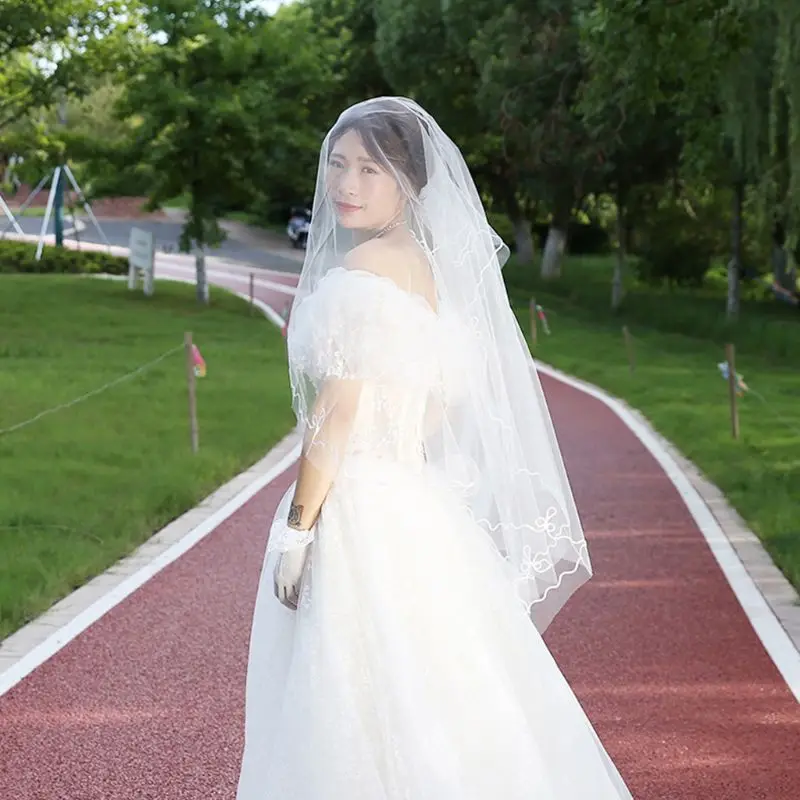 Minimalist One-Layer Women Long White Wedding Veil Water-Soluble Mesh Yarn Wavy Ribbon Trim Cathedral Bridal Veil Without Comb
Minimalist One-Layer Women Long White Wedding Veil Water-Soluble Mesh Yarn Wavy Ribbon Trim Cathedral Bridal Veil Without Comb