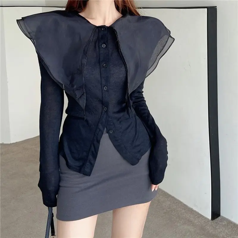 Design sense stitching lotus leaf collar long-sleeved thin single-breasted knitted cardigan women's autumn Korean niche sweater
Design sense stitching lotus leaf collar long-sleeved thin single-breasted knitted cardigan women's autumn Korean niche sweater