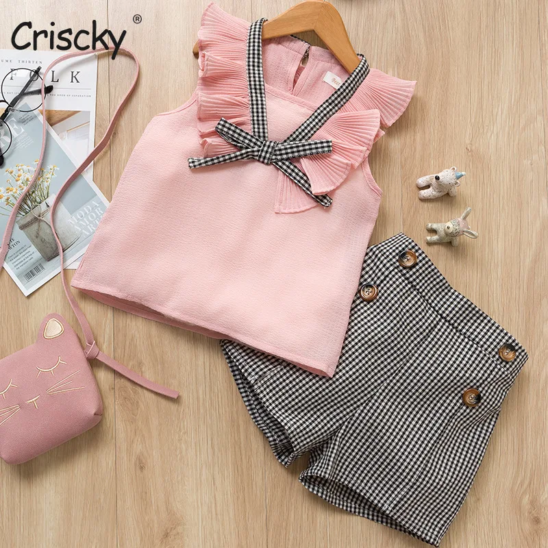 Criscky Summer Girls' Suit 2022 Toddler Baby Girl Sleeveless Ruffled Bowknot Tops+Plaid Shorts 2pcs Sets Children's Clothing
Criscky Summer Girls' Suit 2022 Toddler Baby Girl Sleeveless Ruffled Bowknot Tops+Plaid Shorts 2pcs Sets Children's Clothing
