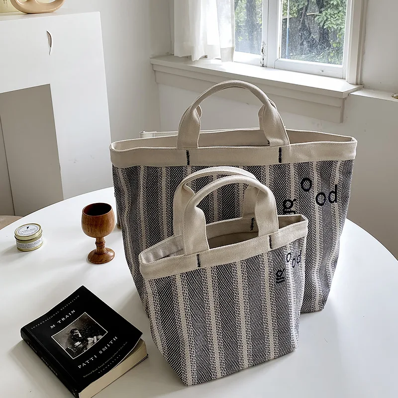 Women Waterproof Canvas Striped Shopping Bag Tote High Capacity Multi-function Portable Mommy Travel Beach Handbag Eco Friendly
Women Waterproof Canvas Striped Shopping Bag Tote High Capacity Multi-function Portable Mommy Travel Beach Handbag Eco Friendly