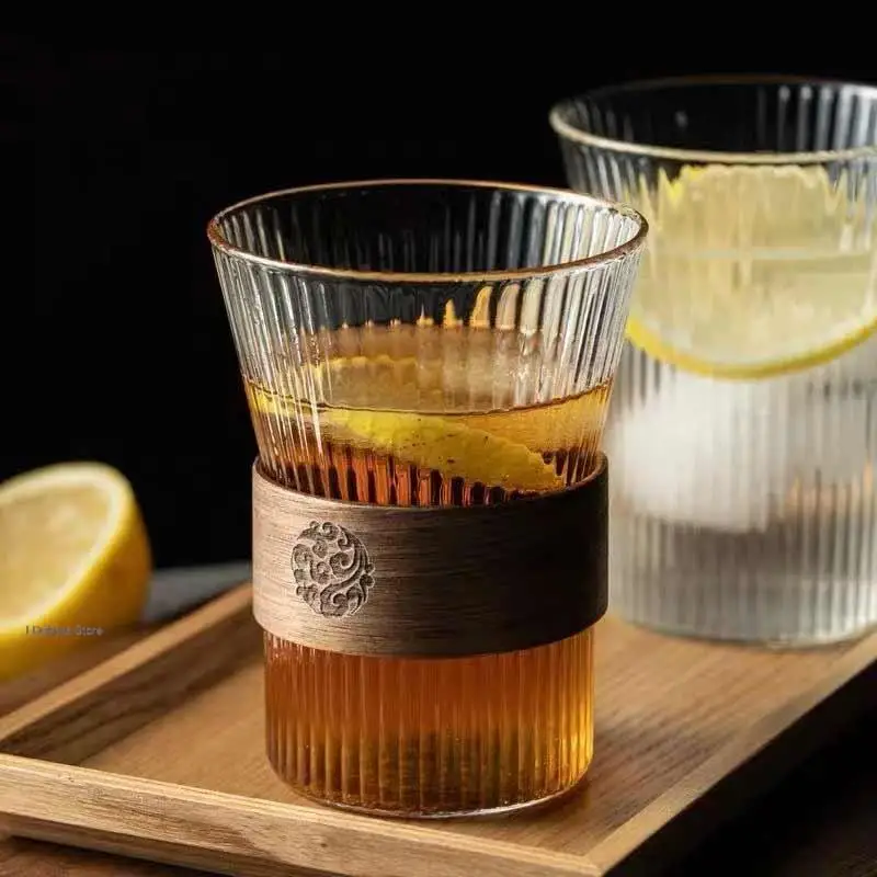 Vertical Lines Transparent Glass Tea Cup With Wood Sleeve Heat Resistant Creative Drinking Glassware Vintage Coffee Glass Cups
Vertical Lines Transparent Glass Tea Cup With Wood Sleeve Heat Resistant Creative Drinking Glassware Vintage Coffee Glass Cups
