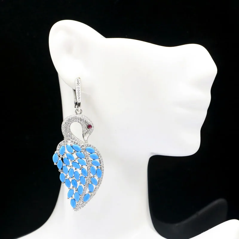 62x24mm Eye Catching Swan Shape Blue Turquoise Pink Morganite Tourmaline White CZ Silver Earrings
62x24mm Eye Catching Swan Shape Blue Turquoise Pink Morganite Tourmaline White CZ Silver Earrings