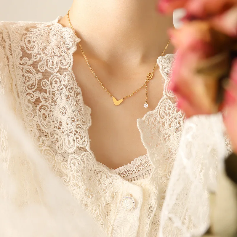 Korean INS Small Fragrant Wind Cute Peach Heart Double Ring Tassel Diamond Pendant Necklace Temperament Plated 18K Gold Jewelry
Korean INS Small Fragrant Wind Cute Peach Heart Double Ring Tassel Diamond Pendant Necklace Temperament Plated 18K Gold Jewelry