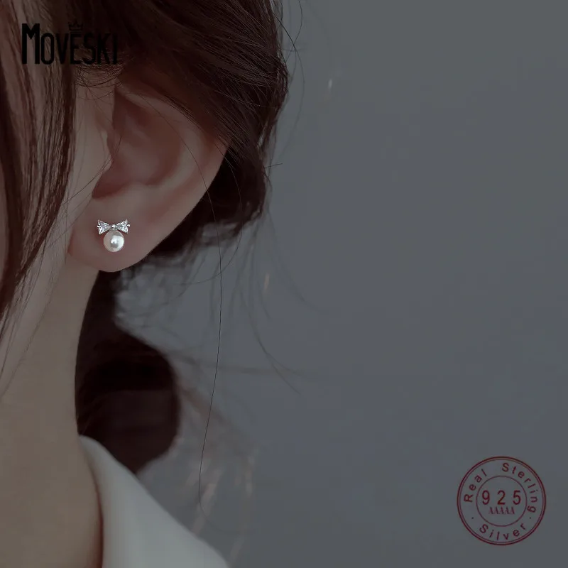 MOVESKI 925 Sterling Silver Elegant Simple Zircon Bow Pearl Stud Earrings Women High Sense Charm Wedding Gift Jewelry
MOVESKI 925 Sterling Silver Elegant Simple Zircon Bow Pearl Stud Earrings Women High Sense Charm Wedding Gift Jewelry