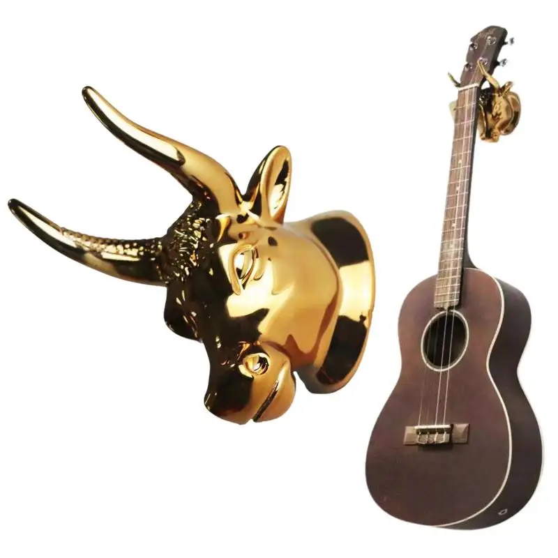 Bull Head Guitar Hanger Hook Copper Plating ABS Material Wall Mounted Bull Art Guitar Ukulele Hook Guitar Hanger
Bull Head Guitar Hanger Hook Copper Plating ABS Material Wall Mounted Bull Art Guitar Ukulele Hook Guitar Hanger