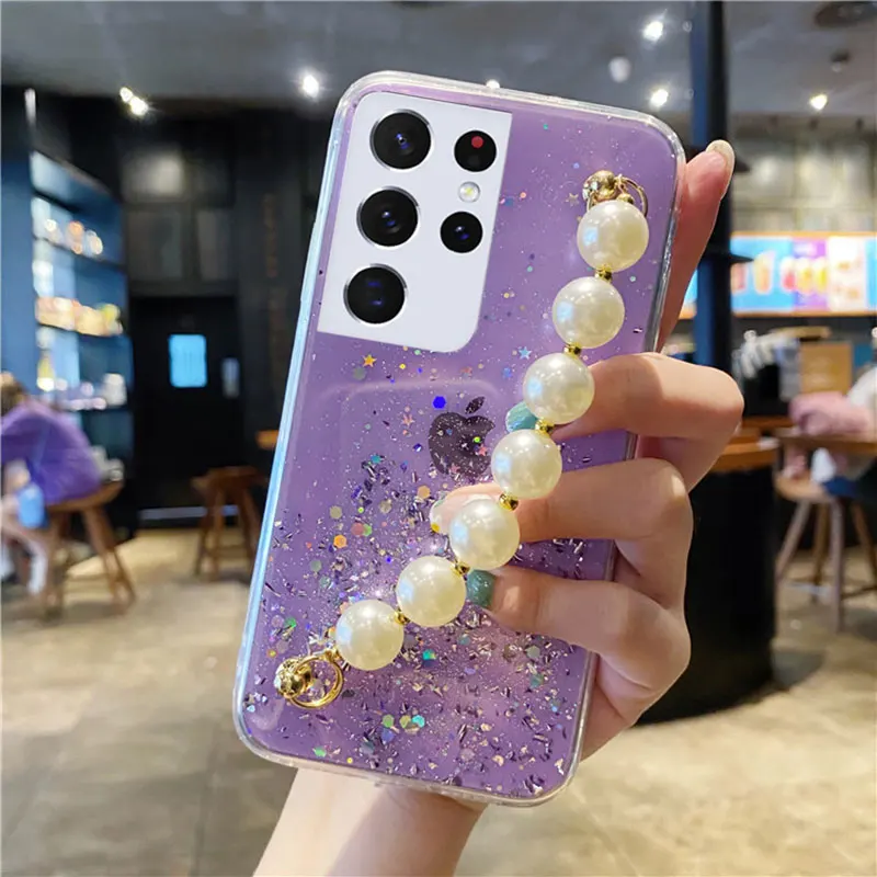 Luxury Wrist Chian Strap Soft Case For Samsung Galaxy S21 S20 S10 S8 S9 S20FE Plus Ultra Note 8 9 10 20 F62 Pearl Bracelet Cover
Luxury Wrist Chian Strap Soft Case For Samsung Galaxy S21 S20 S10 S8 S9 S20FE Plus Ultra Note 8 9 10 20 F62 Pearl Bracelet Cover