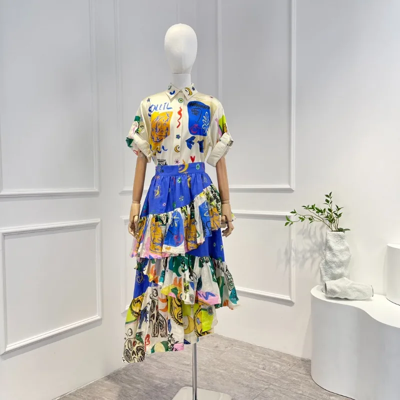 2023 Latest Women Summer Hand Painting Blue Short Sleeve Blouse and Cascading Flouncing Irregular Skirt Set High Quality 
2023 Latest Women Summer Hand Painting Blue Short Sleeve Blouse and Cascading Flouncing Irregular Skirt Set High Quality