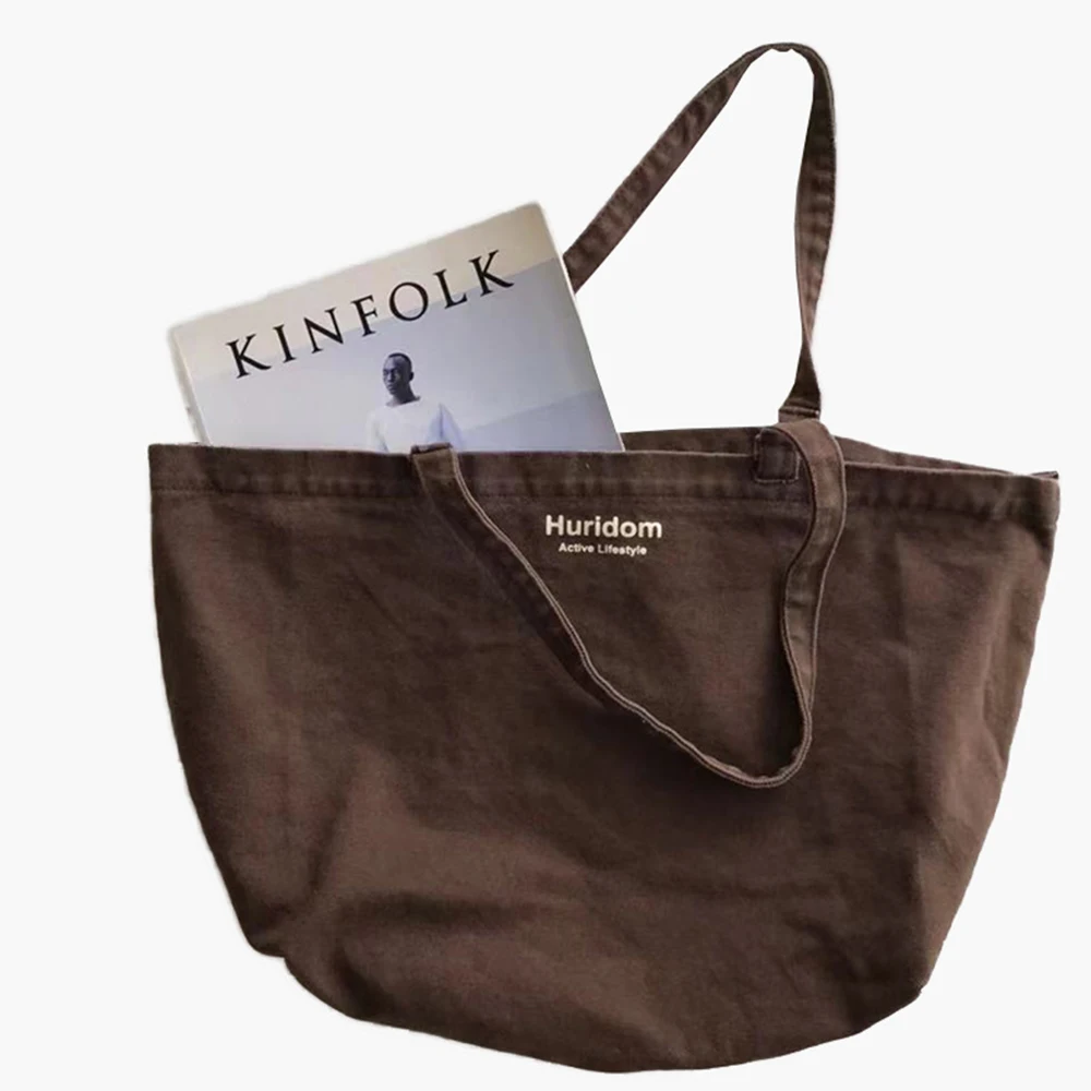 New Retro Women's Shoulder Bag Simple Solid Color Small Fresh Canvas Bag Literary Women's Buckle Tote Bag Large Capacity Handbag
New Retro Women's Shoulder Bag Simple Solid Color Small Fresh Canvas Bag Literary Women's Buckle Tote Bag Large Capacity Handbag