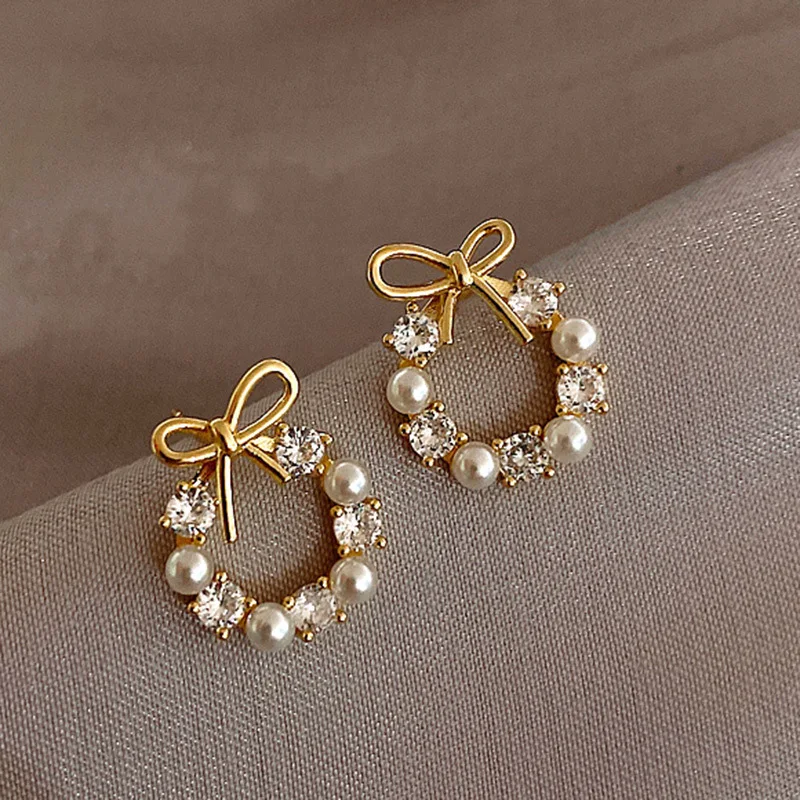 DREJEW Pearl Earrings For Women Korean Fashion Crystal Earrings Cute Bowknot Stud Earrings Jewelry Items With Free Shipping
DREJEW Pearl Earrings For Women Korean Fashion Crystal Earrings Cute Bowknot Stud Earrings Jewelry Items With Free Shipping