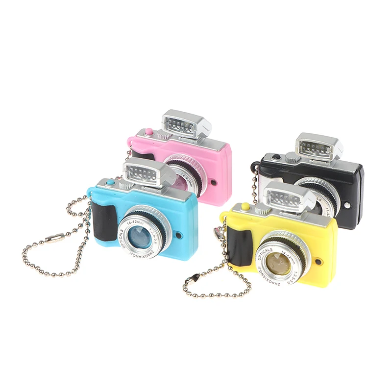 Mini Digital Reflex DSLR Camera LED Flash Light Torch Shutter Sound Keychain
Mini Digital Reflex DSLR Camera LED Flash Light Torch Shutter Sound Keychain