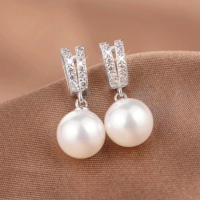 Ne'w New Trendy Simulated Pearl Dangle Earrings for Women Fashion Wedding Engagement Accessories Simple Stylish Girls Earrings
Ne'w New Trendy Simulated Pearl Dangle Earrings for Women Fashion Wedding Engagement Accessories Simple Stylish Girls Earrings