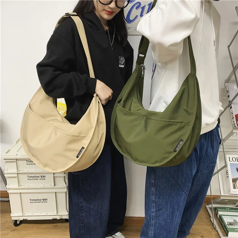 Crossbody Shoulder Bags Woman Men Large Messenger Bag Student Nylon Female Book Bag Boys Simple Casual Dumpling Bag
Crossbody Shoulder Bags Woman Men Large Messenger Bag Student Nylon Female Book Bag Boys Simple Casual Dumpling Bag