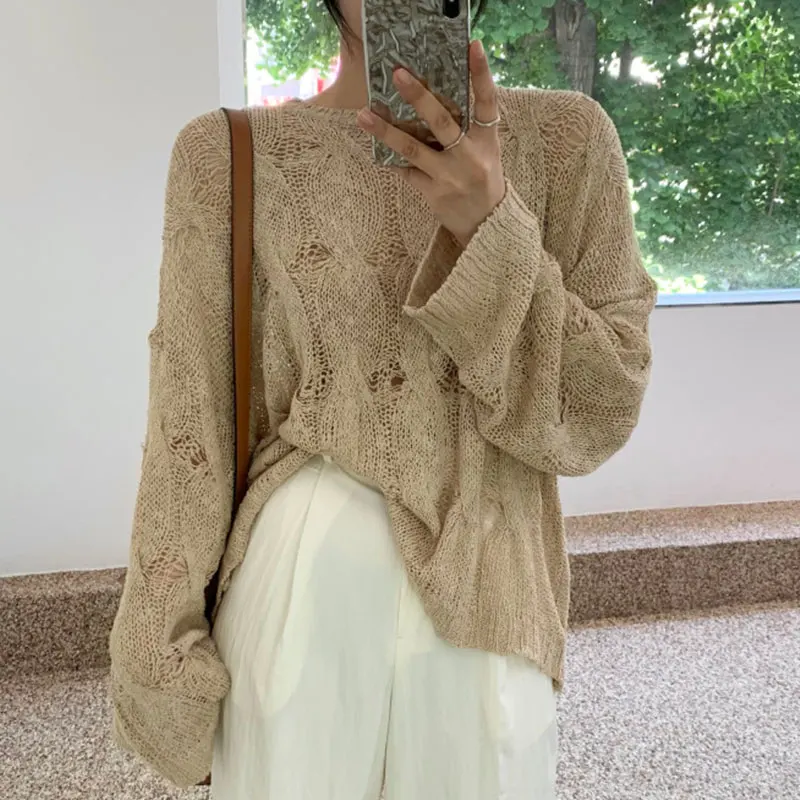 Autumn New Korean Style Long-sleeved Sexy Hole Sweater Asymmetric Hem Loose Pullover Hollow Out Thin Knit Sweater Jumper Tops
Autumn New Korean Style Long-sleeved Sexy Hole Sweater Asymmetric Hem Loose Pullover Hollow Out Thin Knit Sweater Jumper Tops