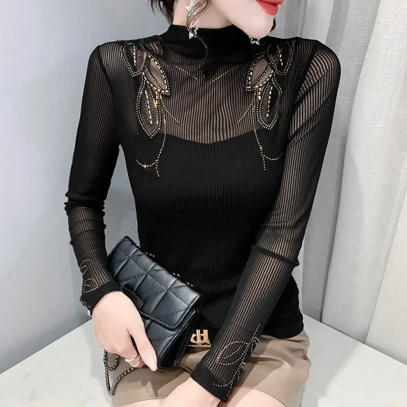 European autumn and winter embroidery stitching hot drill long sleeve shirt female sense hollow semi-high collar bottoming shirt
European autumn and winter embroidery stitching hot drill long sleeve shirt female sense hollow semi-high collar bottoming shirt