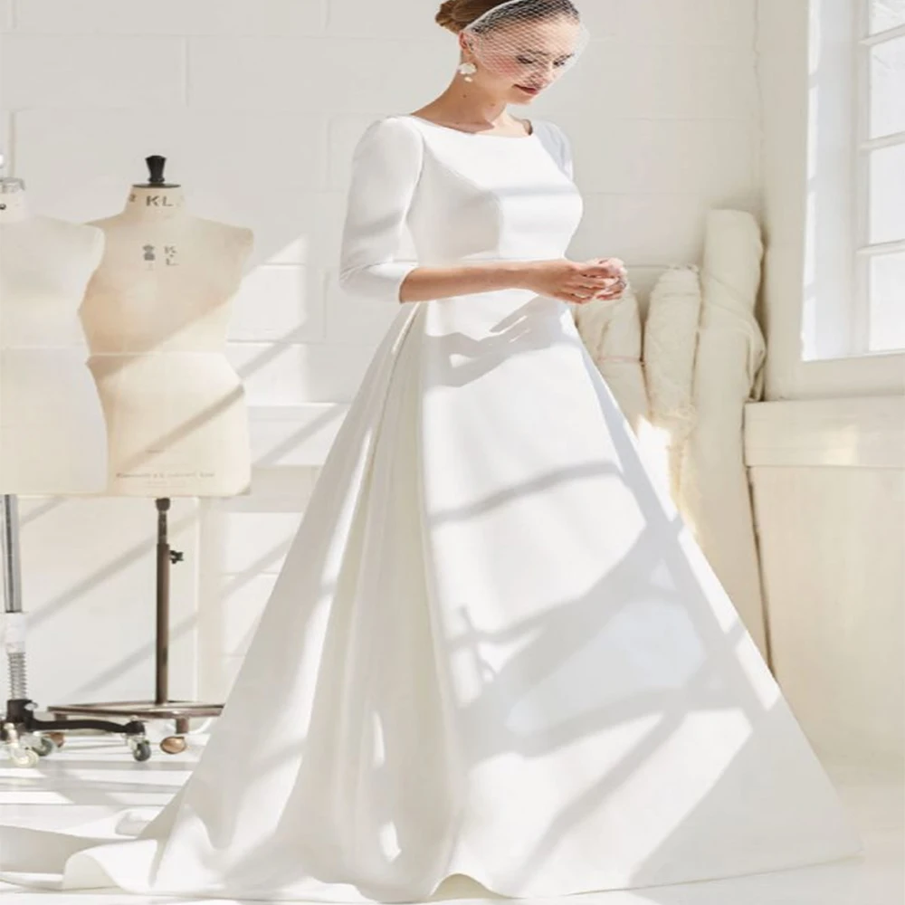 Simple Wedding Dresses High Quality Elegant A-line Regular Sleeves Open Back Button Sweep Train Smooth Women Bridal Gown
Simple Wedding Dresses High Quality Elegant A-line Regular Sleeves Open Back Button Sweep Train Smooth Women Bridal Gown