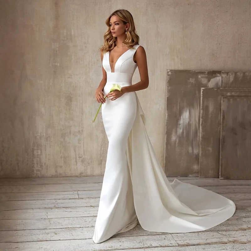Sexy Deep V-Neck Mermaid Wedding Dress Boho Sleeveless Off The Shoulder Bridal Gown Backless Bow Satin Train Vestido De Noiva
Sexy Deep V-Neck Mermaid Wedding Dress Boho Sleeveless Off The Shoulder Bridal Gown Backless Bow Satin Train Vestido De Noiva