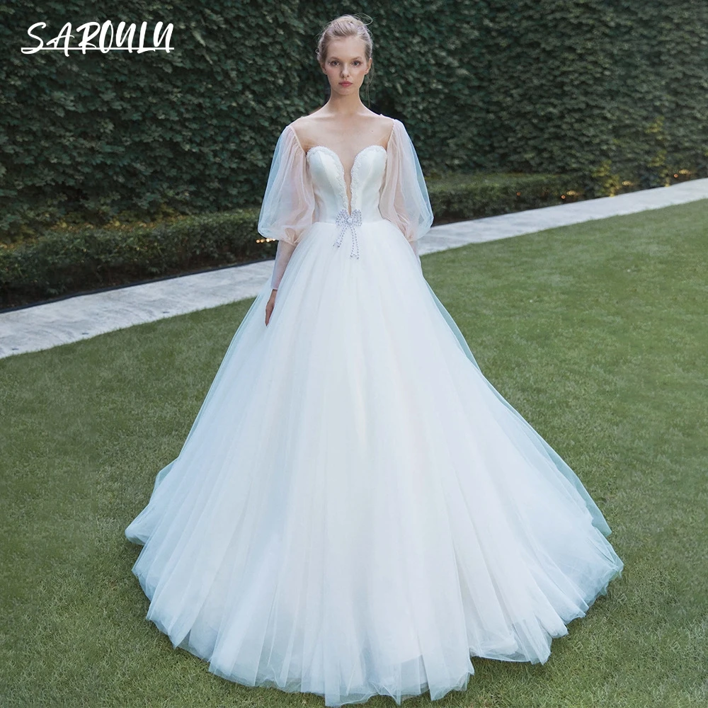 Romantic Crystal Bow Tie A-line Wedding Dress Tulle Puff Sleeve Lace-up Backless Bride Robe Bridal Wedding Gown Vestido De Novia
Romantic Crystal Bow Tie A-line Wedding Dress Tulle Puff Sleeve Lace-up Backless Bride Robe Bridal Wedding Gown Vestido De Novia