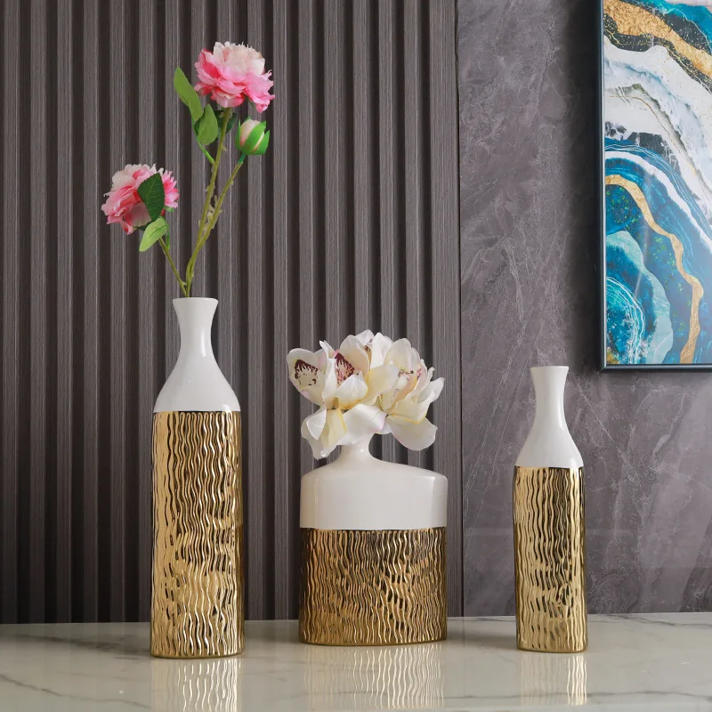 Nordic Light luxur gold painted ceramic high-end vases personalized living room decoration TV cabinet creative Christmas gift
Nordic Light luxur gold painted ceramic high-end vases personalized living room decoration TV cabinet creative Christmas gift