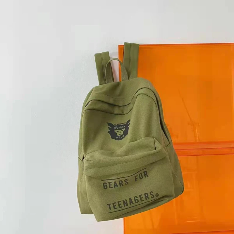 HUMAN MADE Backpacks Canvas Men Women Hip Hop Four Seasons Outdoor Sports Bag Travel Backpack Original Logo Print High Quality
HUMAN MADE Backpacks Canvas Men Women Hip Hop Four Seasons Outdoor Sports Bag Travel Backpack Original Logo Print High Quality