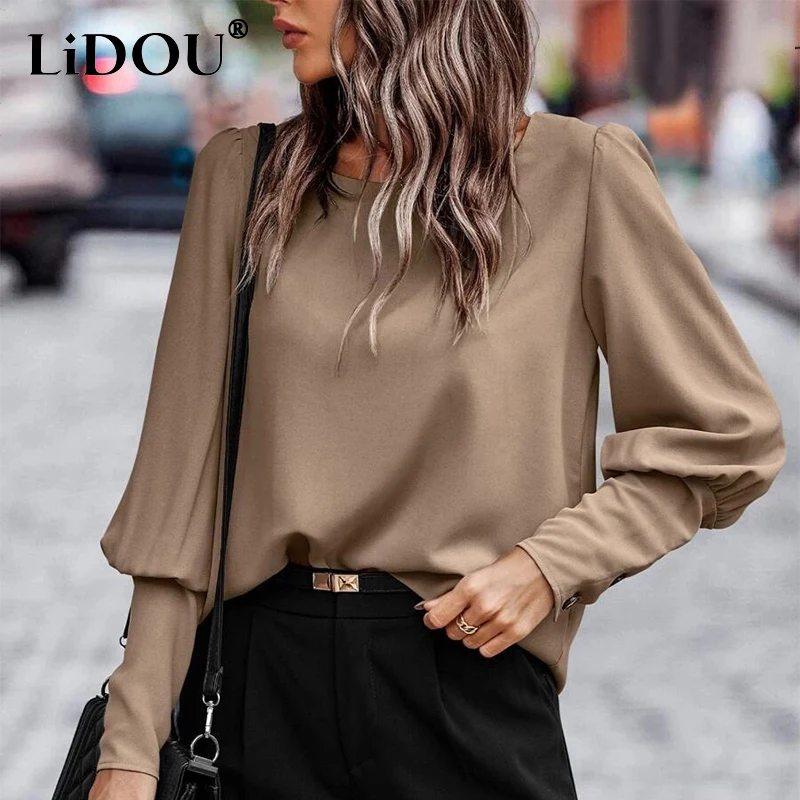 Spring Autumn Women's Elegant Lantern Long Sleeve Tees Ladies Chic Buttons All-match Top Women Solid Color Casual Fashion T-shir
Spring Autumn Women's Elegant Lantern Long Sleeve Tees Ladies Chic Buttons All-match Top Women Solid Color Casual Fashion T-shir