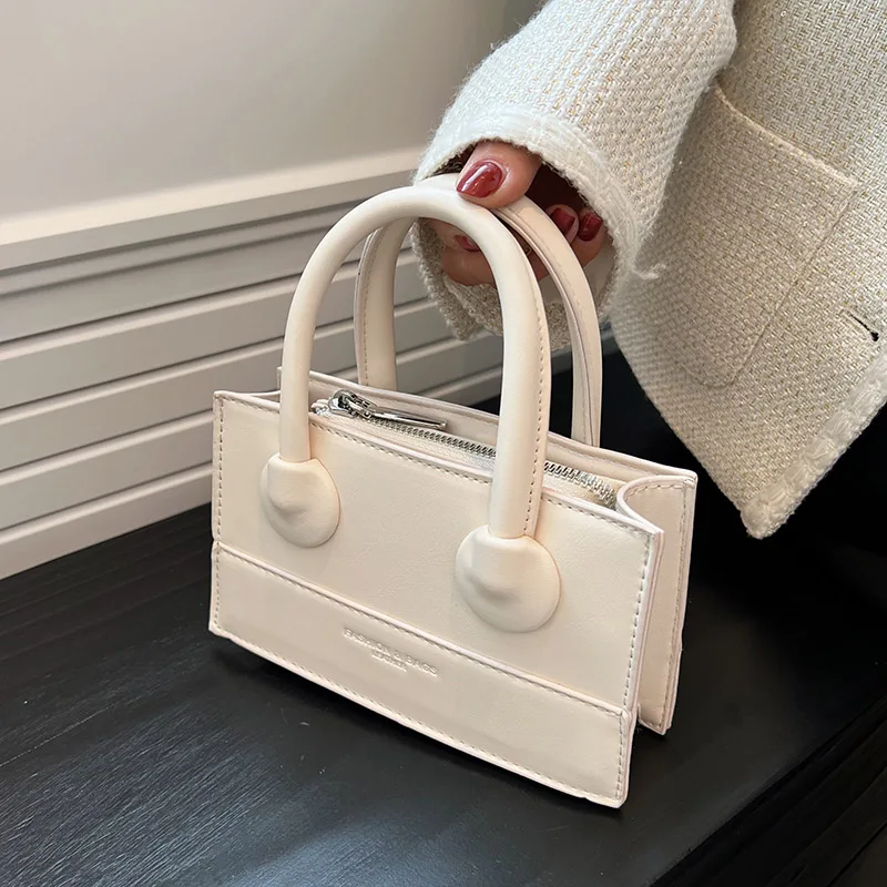 Luxury Simple 2022 Summer Trend Brand Shoulder Bag for Women Mini PU Leather Crossbody Bag Designer Handbags Cute Tote Bags
Luxury Simple 2022 Summer Trend Brand Shoulder Bag for Women Mini PU Leather Crossbody Bag Designer Handbags Cute Tote Bags