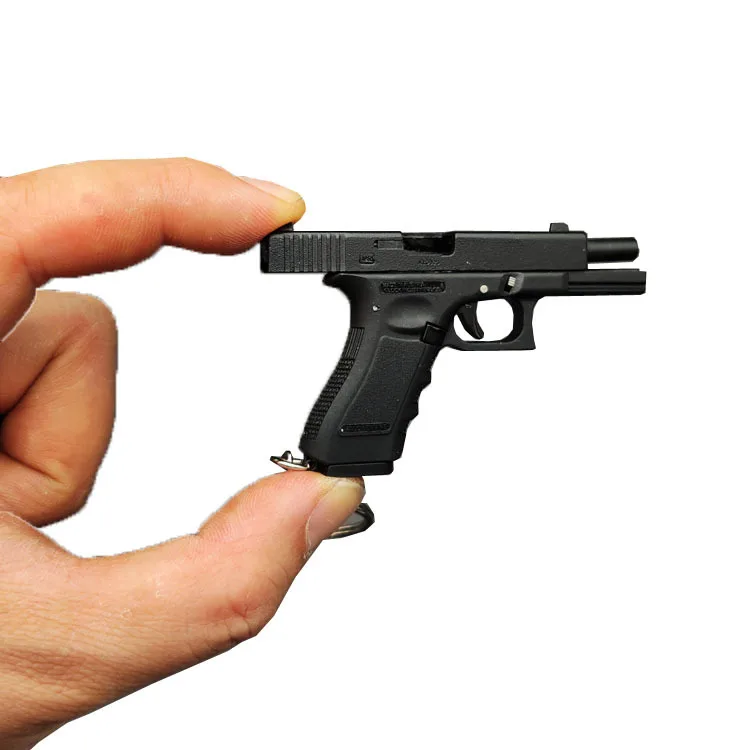 Металлическая мини-кобура для пистолета Glock 17 брелок для пистолета реальная модель для самозащиты в форме брызговика
Металлическая мини-кобура для пистолета Glock 17 брелок для пистолета реальная модель для самозащиты в форме брызговика