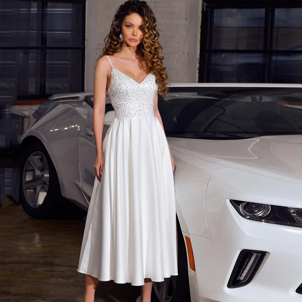 Spaghetti Strap V-neck Wedding Dresses Exquisite Sequined Preals Bridal Dress Women Tea Length Simple A-line Draped Bride Gown
Spaghetti Strap V-neck Wedding Dresses Exquisite Sequined Preals Bridal Dress Women Tea Length Simple A-line Draped Bride Gown