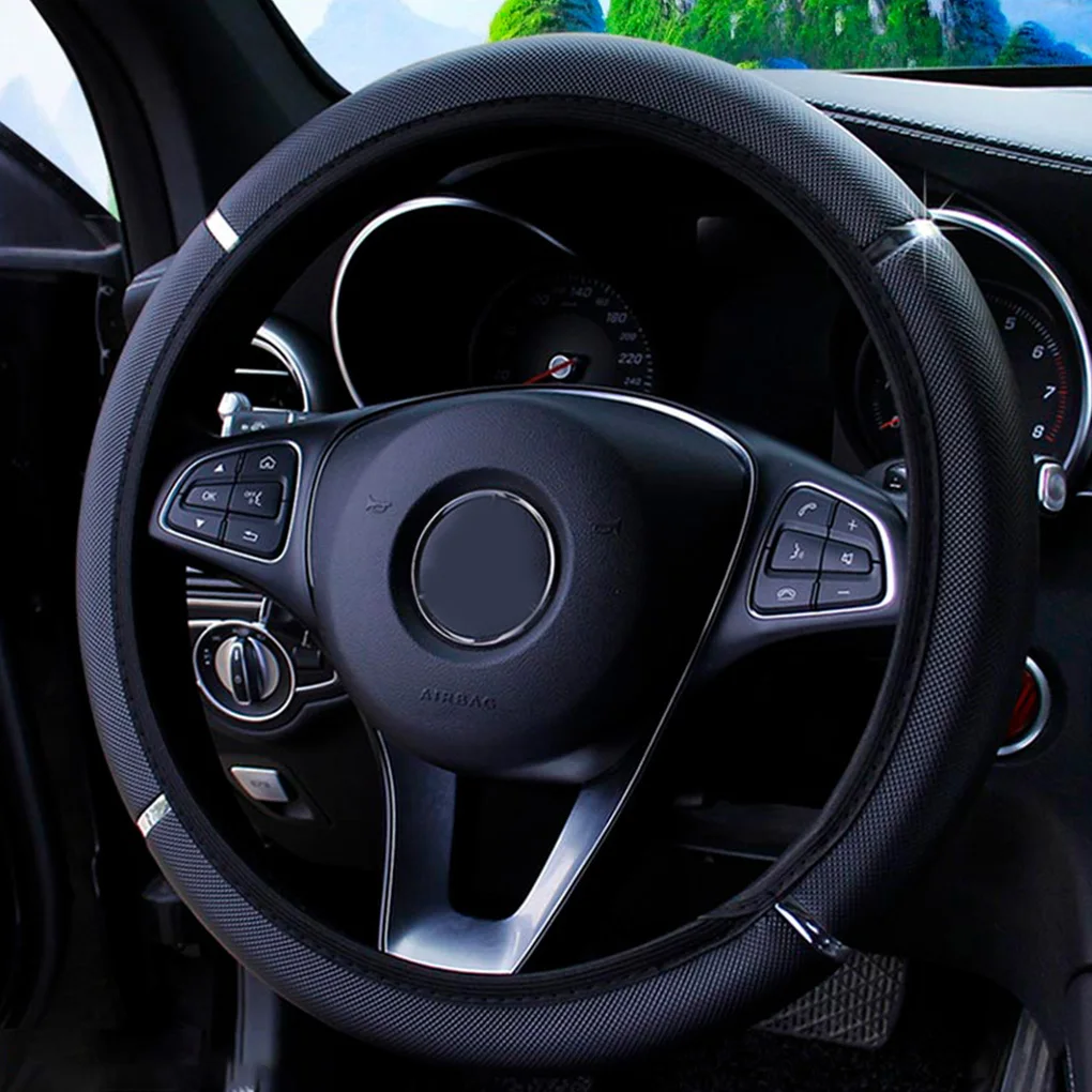 Универсальный чехол рулевого колеса автомобиля 15 дюймов искусственная кожа нескользящий эластичный дышащий чехол с ручкой
Универсальный чехол рулевого колеса автомобиля 15 дюймов искусственная кожа нескользящий эластичный дышащий чехол с ручкой