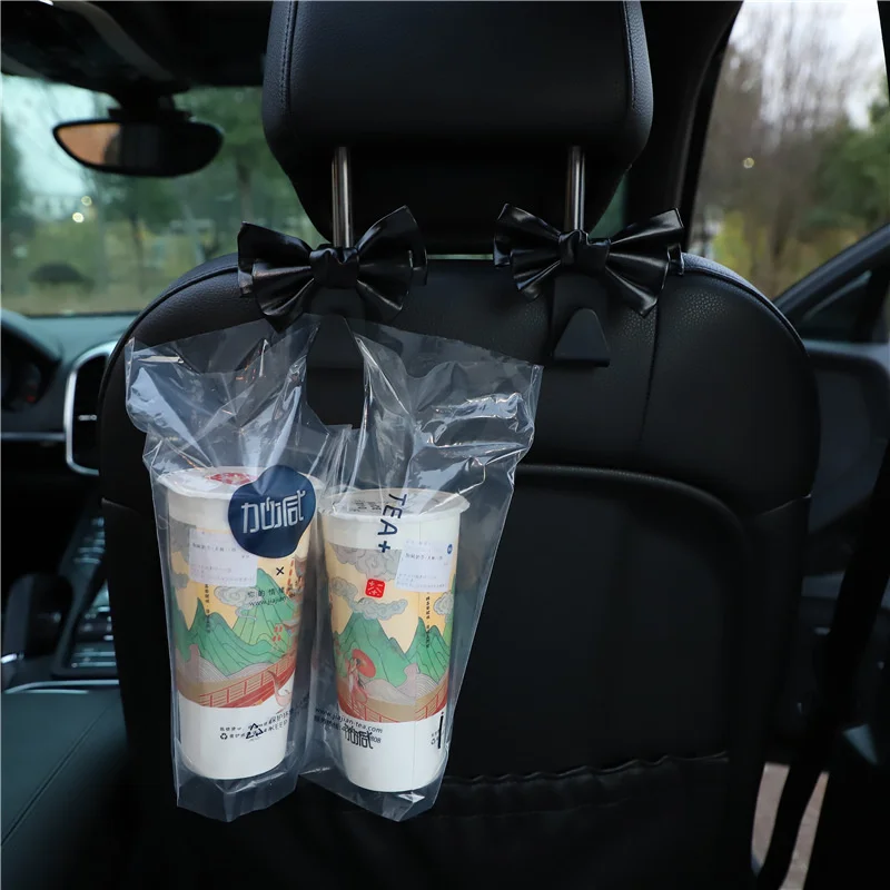 Creative aesthetic bow car hook temperament car seat back hook fashion car interior accessories wholesale
Creative aesthetic bow car hook temperament car seat back hook fashion car interior accessories wholesale