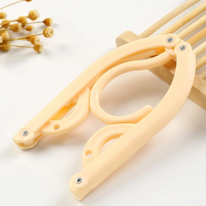 Multifunctional Magic Travel Folding Clothes Hanger Portable Retractable Travel Home Clothes Hanger
Multifunctional Magic Travel Folding Clothes Hanger Portable Retractable Travel Home Clothes Hanger