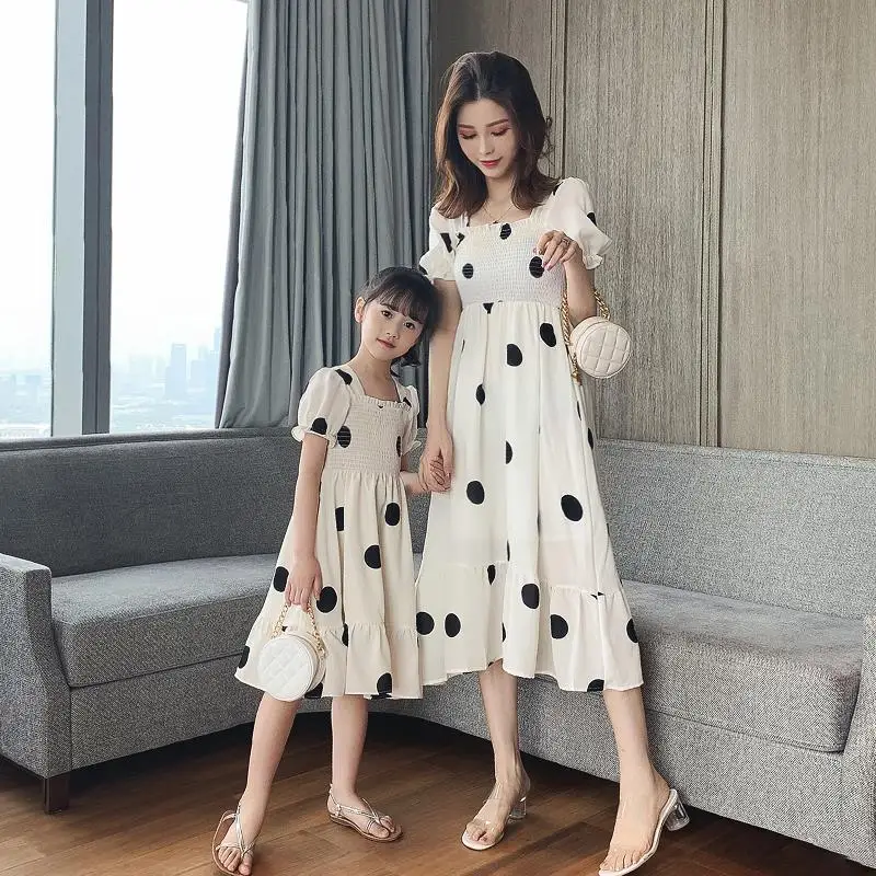 Mother and Daughter Polka Dot Dresses Summer New Fashion Children's Clothing Small Fresh Puff Sleeve Parent-child Princess Dress
Mother and Daughter Polka Dot Dresses Summer New Fashion Children's Clothing Small Fresh Puff Sleeve Parent-child Princess Dress