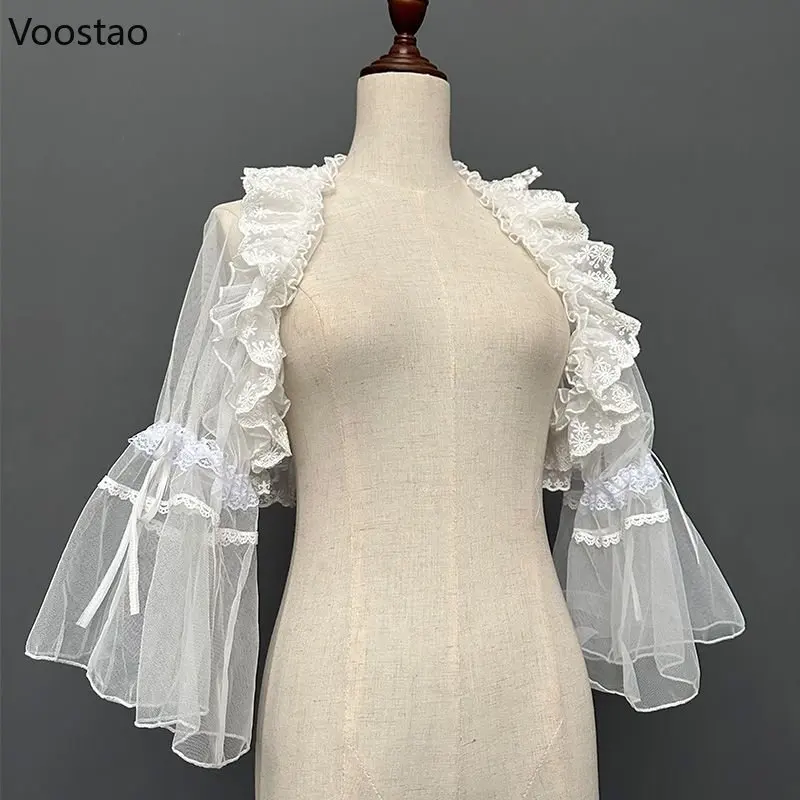 Kawaii Lolita Lace Short Coat Japanese Sweet Mesh Flare Sleeve Open Front Covers Women Elegant Cute Cardigan Crop Tops Outerwear
Kawaii Lolita Lace Short Coat Japanese Sweet Mesh Flare Sleeve Open Front Covers Women Elegant Cute Cardigan Crop Tops Outerwear