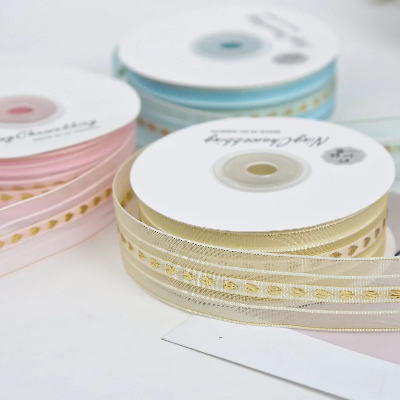 2.5cm wide (18m/20 yards/roll) Love Heart Gold Thread snow gauze tape diy Handmade packaging material webbed cake gift ribbon
2.5cm wide (18m/20 yards/roll) Love Heart Gold Thread snow gauze tape diy Handmade packaging material webbed cake gift ribbon