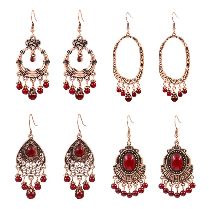 

Wholesale Fashion New Retro Red Garnet Bohemia Earrings Female Trend Lucky Eardrops to Make round Face Thin-Looked