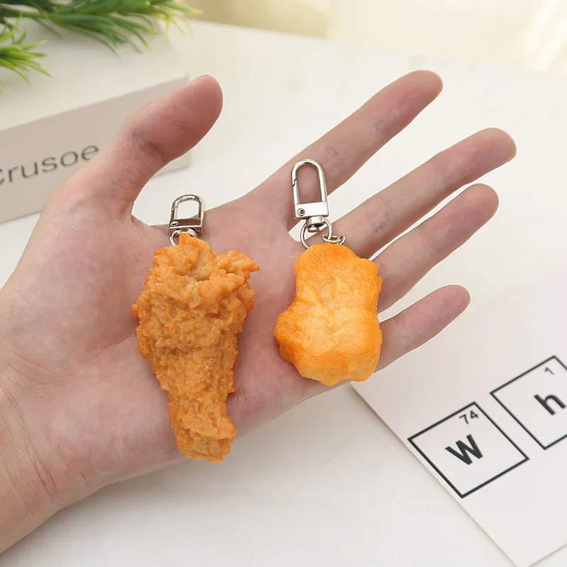 Simulated fried chicken key chain new food men women bag car pendant creative model llaveros ornaments jewelry gift Trinkets
Simulated fried chicken key chain new food men women bag car pendant creative model llaveros ornaments jewelry gift Trinkets