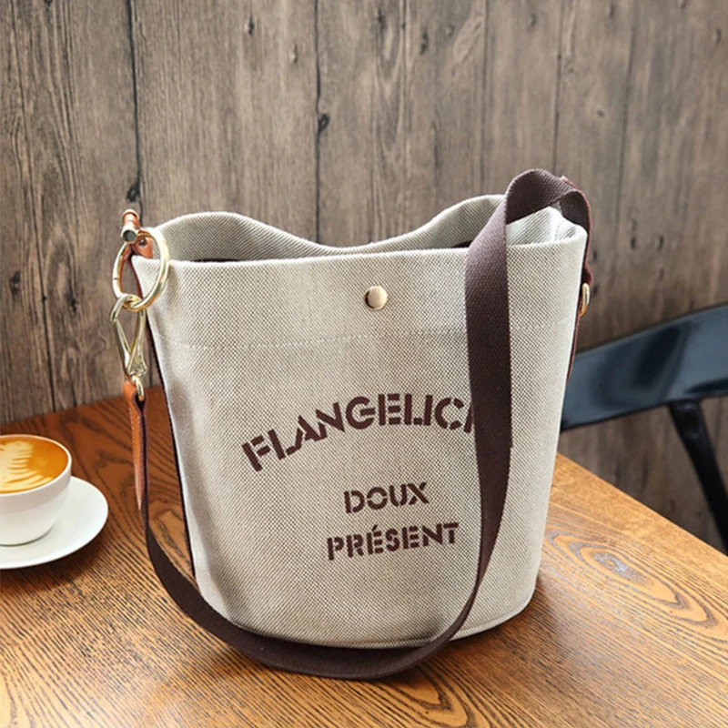 Canvas Bag Women's Ladies Handbags Female 2023 New Korean College Students Button Letter Casual Messenger Bag Bucket Handbag 
Canvas Bag Women's Ladies Handbags Female 2023 New Korean College Students Button Letter Casual Messenger Bag Bucket Handbag