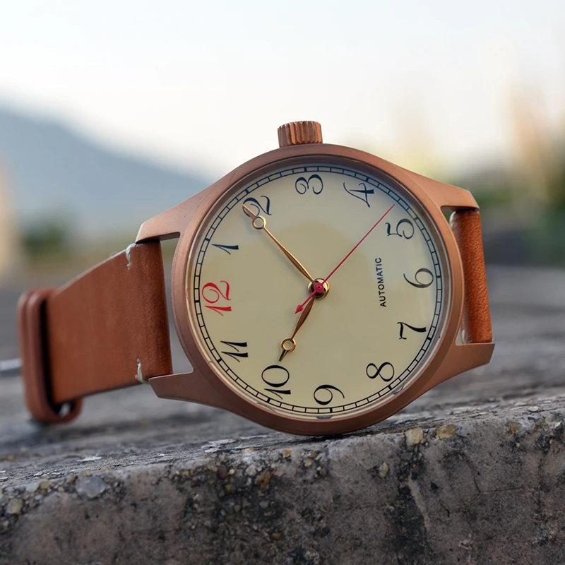 42mm Bronze Vintage Automatic Watch Cusn8 Bronze Case Leather Strap ST2130 Titanium Caseback Red 12 Calendar Watch
42mm Bronze Vintage Automatic Watch Cusn8 Bronze Case Leather Strap ST2130 Titanium Caseback Red 12 Calendar Watch