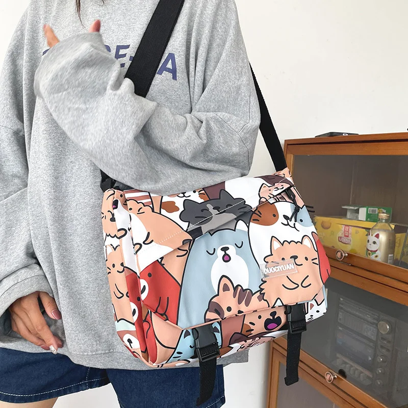 Cute bag college style funny personality cartoon cat soft girl student messenger bag
Cute bag college style funny personality cartoon cat soft girl student messenger bag