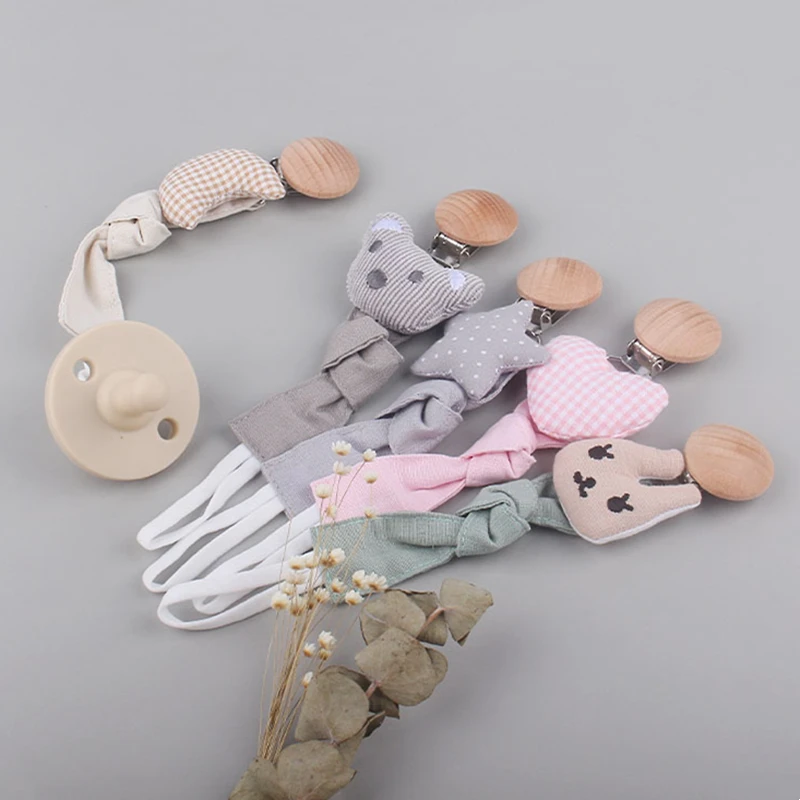 Safety Wooden Baby Infant Toddler Dummy Pacifier Cotton Doll Soother Nipple Clip Chain Holder Strap Baby Cartoon Toy
Safety Wooden Baby Infant Toddler Dummy Pacifier Cotton Doll Soother Nipple Clip Chain Holder Strap Baby Cartoon Toy
