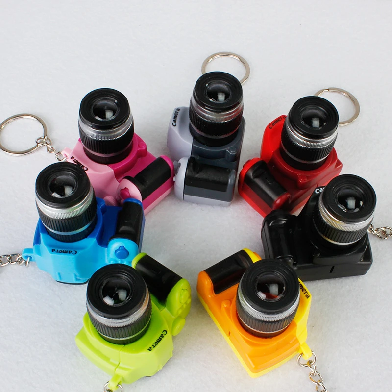 New LED Camera Funny Toy Keychain With Flashlight Kids Cartoon Pendant Key Holder For Bag Car Decor Gift Action Toy Figures
New LED Camera Funny Toy Keychain With Flashlight Kids Cartoon Pendant Key Holder For Bag Car Decor Gift Action Toy Figures
