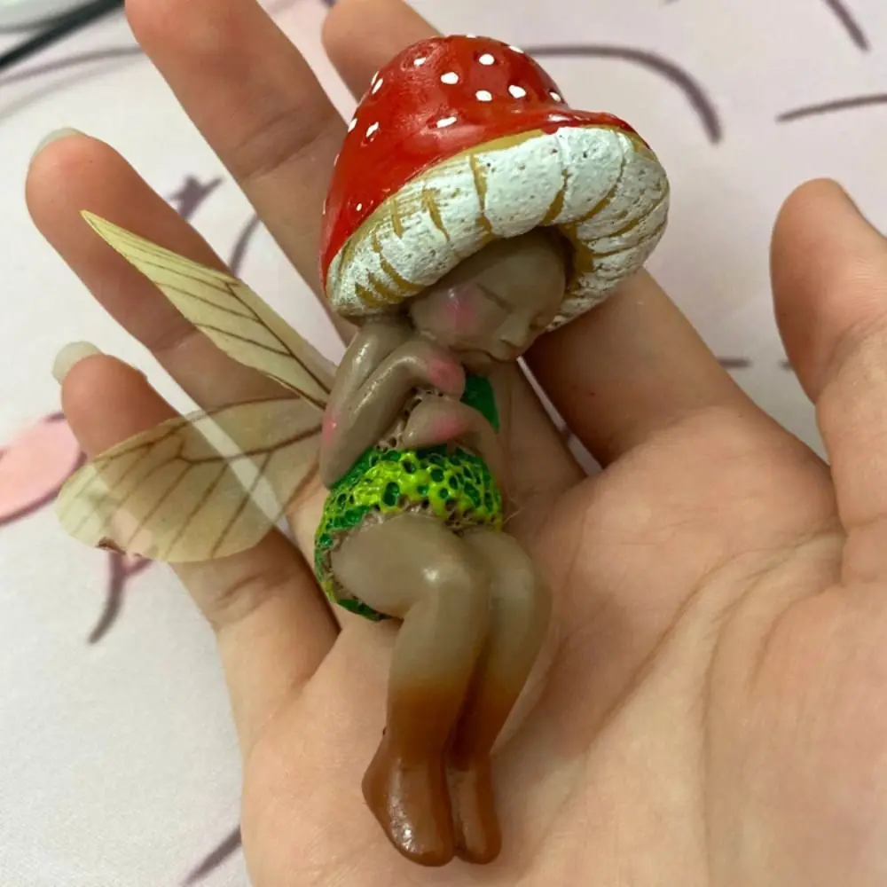 Resin Ornament Sleeping Fairy Resin Handicraft Sleeping Mushroom Elf Ornaments Small Forest Mushroom Fairy Ornaments
Resin Ornament Sleeping Fairy Resin Handicraft Sleeping Mushroom Elf Ornaments Small Forest Mushroom Fairy Ornaments