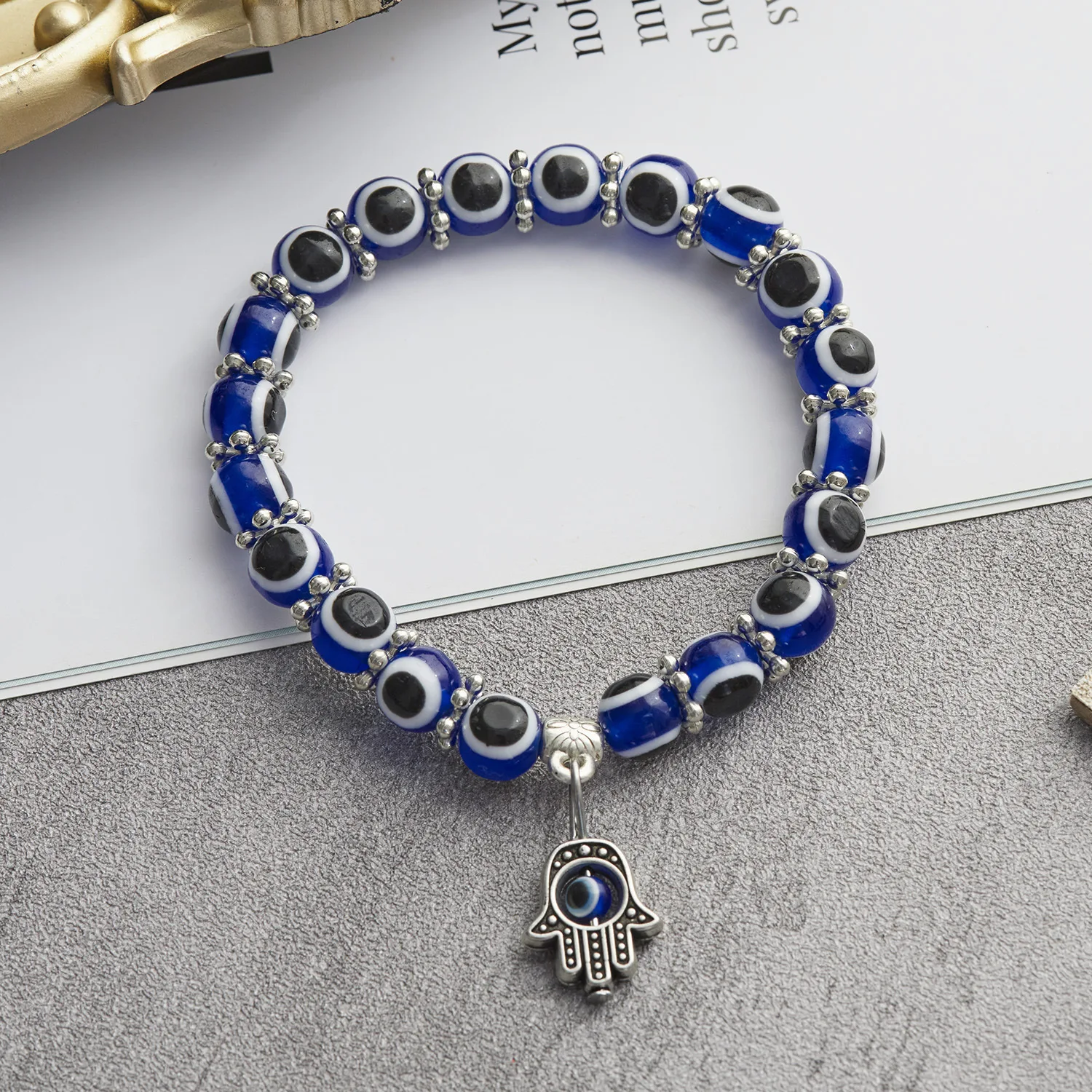 Hot Sale New Fashion Eye Bracelet 8mm Palm Hollow Blue Eye Beaded Pendant Elastic Bracelet for Women
Hot Sale New Fashion Eye Bracelet 8mm Palm Hollow Blue Eye Beaded Pendant Elastic Bracelet for Women