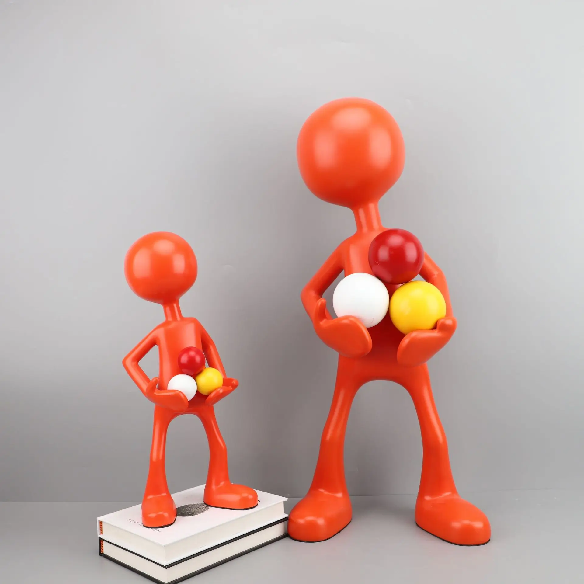 Modern minimalist creative resin orange torball figure model room office study desktop living room soft decoration
Modern minimalist creative resin orange torball figure model room office study desktop living room soft decoration