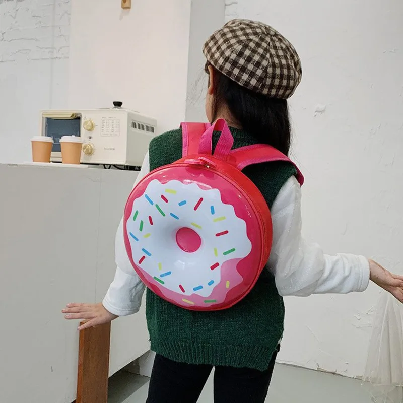 Children's Schoolbag New Cartoon Backpack Kindergarten Kids Doughnut Rainbow Rocket Boys And Girls Hard Double Shoulder Bag
Children's Schoolbag New Cartoon Backpack Kindergarten Kids Doughnut Rainbow Rocket Boys And Girls Hard Double Shoulder Bag